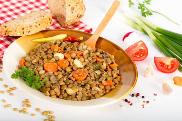 istock Lentil soup stew meal with lentils in a plate 675068156