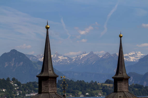 Town hall and mountains in the background, Lucerne, Switzerland