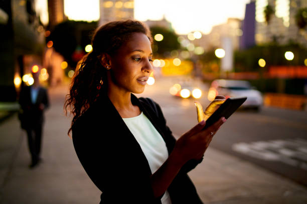 istock Digital tablet at night in the city. 675068702