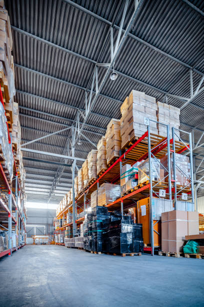 istock Long shelves with a variety of boxes and containers 675070240