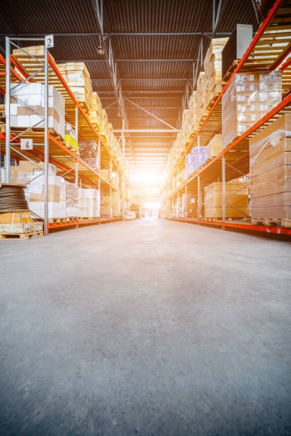 istock Long shelves with a variety of boxes and containers 675070324