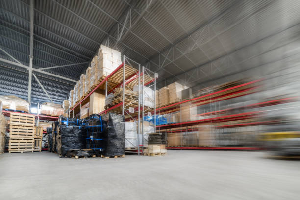 istock Long shelves with a variety of boxes and containers 675070336