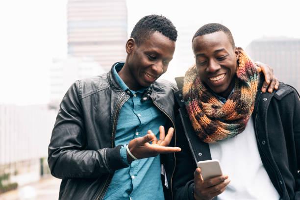 istock Business men using mobile in the Street. 675070796