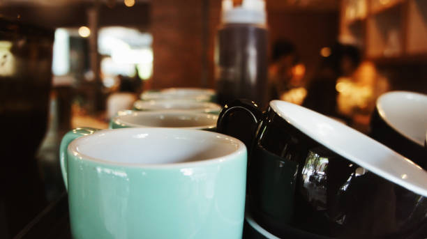 istock close up coffee cup  in coffee shop blurr background. 675073140