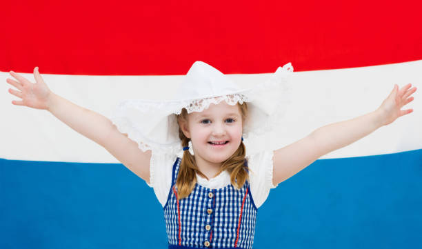 Dutch child with flag of Netherlands