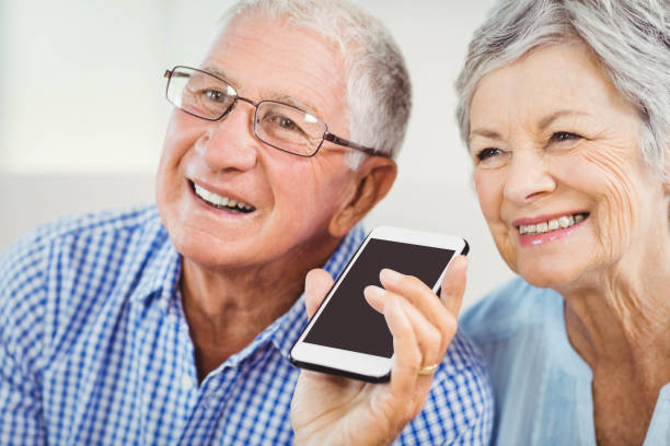 istock Senior couple talking on mobile phone 675075906