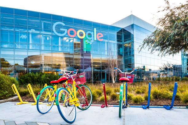 Bikes at Googleplex - Google Headquarters Mountain View, Ca/USA December 29, 2016: Googleplex - Google Headquarters with biked on foreground google brand name photos stock pictures, royalty-free photos & images