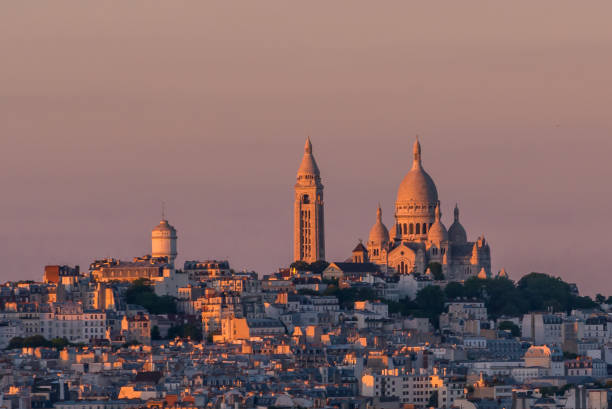 istock Sunset view over Sacre Coeur Basilica in Paris 675081614