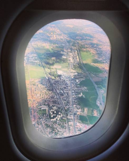 istock Aerial view on Paris suburbs from landing airplane 675083230