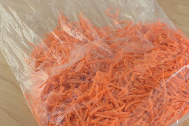 istock Bag of shedded carrots 675084118