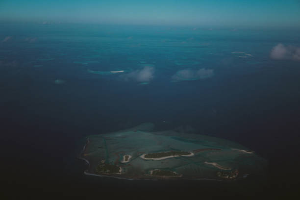 istock Look from the plane on islands, Maldives 675085700