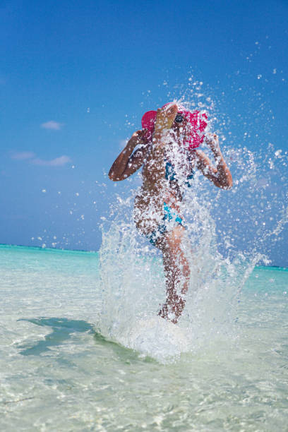 istock Blonde woman have fun on Maldives 675085738