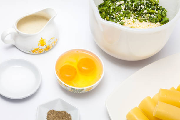 istock Ingredients to prepare the spinach and cheese filling 675087452