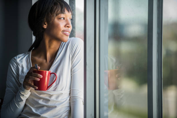 istock Young African American Woman with Coffee 675090716