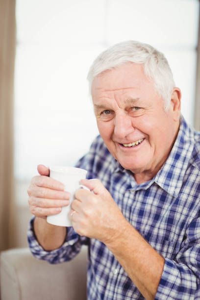 istock Senior man having a cup of coffee 675091372