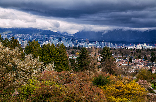 Vancouver cityscape view from Queen Elizabeth Park on a cold cloudy spring afternoon.