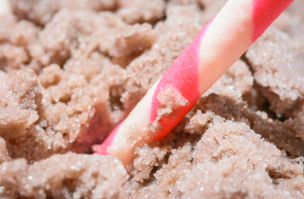 wafer rolls wafer rolls filled with strawberry on ice cream ice cream with wafer rolls stock pictures, royalty-free photos & images