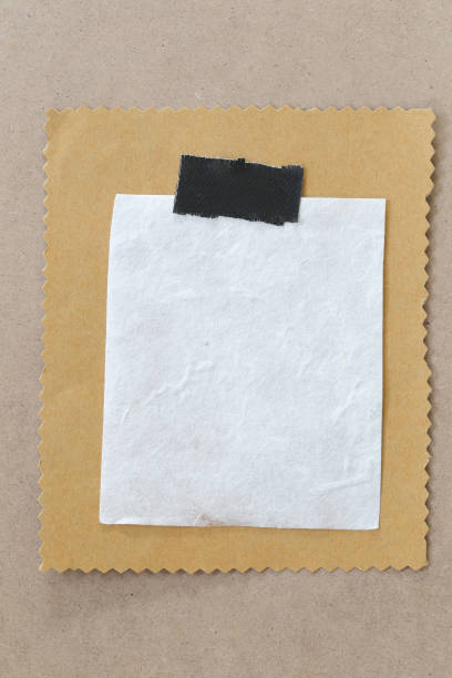 istock vintage of cardboard on brown background 675093652