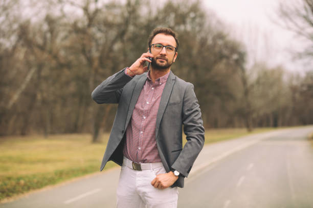 istock Modern businessman talking on his cellphone outdoors. 675095878