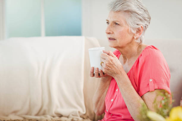istock Senior woman drinking a cup of coffee 675176932