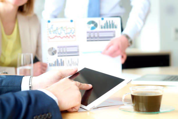 istock Business colleagues working and analyzing financial figures on a graphs 675179326