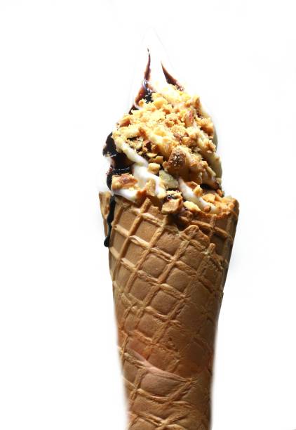 istock soft serve ice cream in a cone with topping 675195472