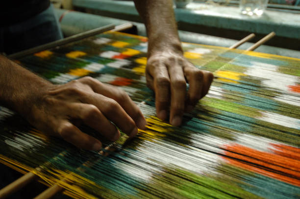 production and weaving of carpets and fabrics