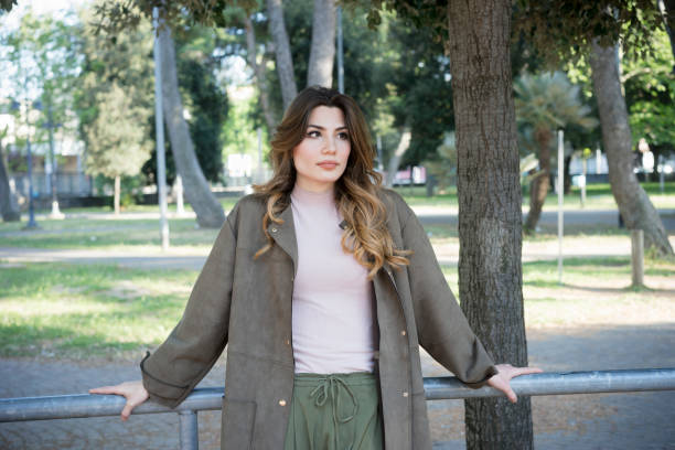 istock Girl waiting in a park 675200760