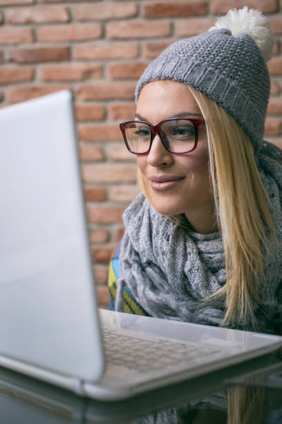 istock Attractive hipster women working on laptop at her office 675203220
