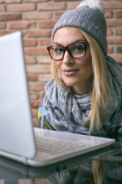 istock Attractive hipster women working on laptop at her office 675203328