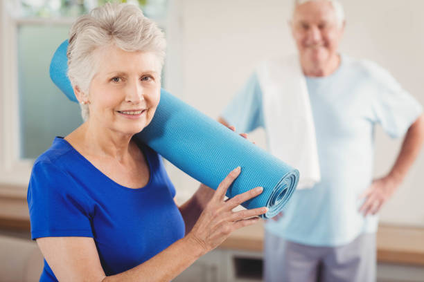 istock Senior couple packing up after workout 675205694