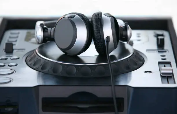 Photo of Professional Headphones on the board dj