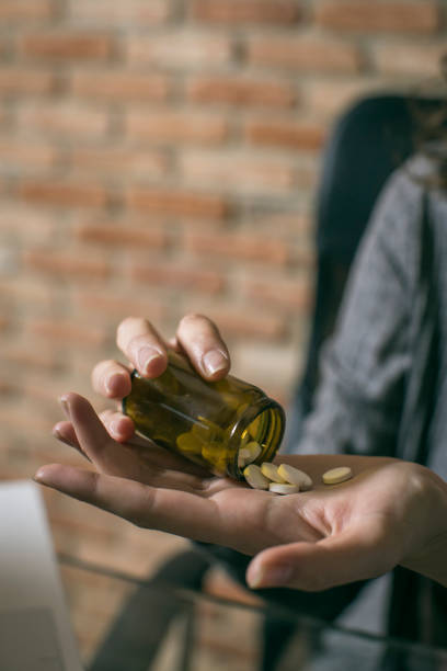 istock Close-up, women hand with pills 675209322