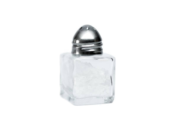 istock Sea salt on white isolated background 675210332