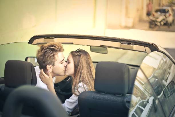 istock Couple in a cabrio 675227026