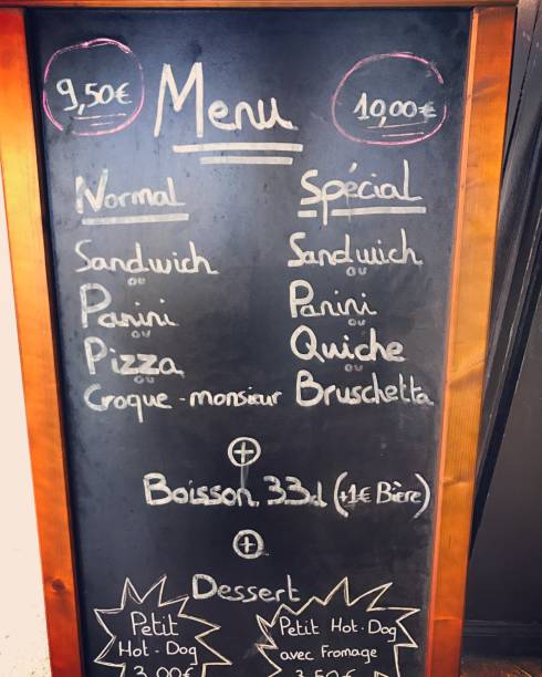 istock Menu of Paris cafe displayed outdoors 675227092