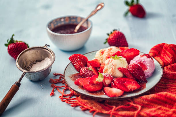 istock Homemade Vanilla Ice Cream with Fresh Strawberries 675227124