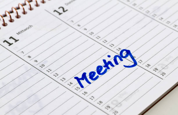 istock Entry in a calendar - Meeting 675228166