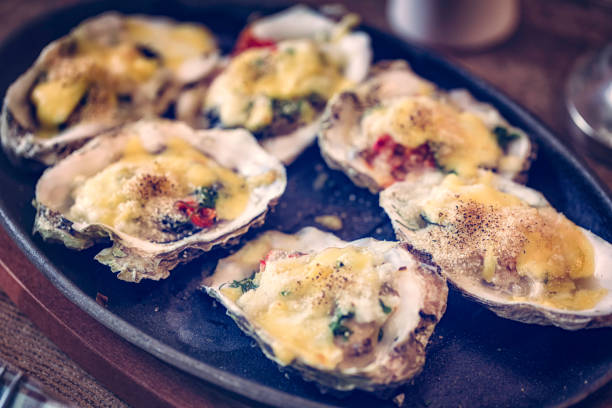 istock Eating Baked Oysters au Gratin 675230350
