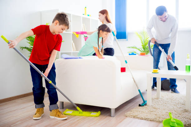 istock Family cleaning house 675230970