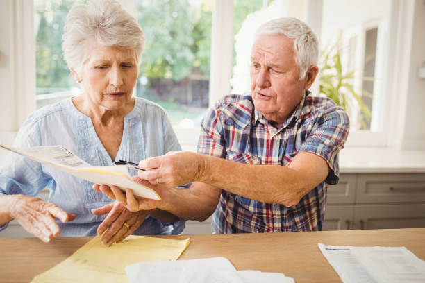 istock Worried senior couple discussing their bills 675233244