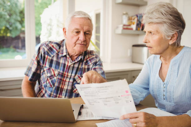 istock Worried senior couple discussing their bills 675233282
