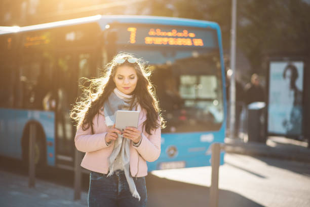 women using tablet in budapest women, city, night, smart phone, bus hungary stock pictures, royalty-free photos & images