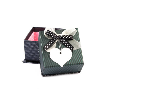 istock Black gift box with white heart price tag 675243876