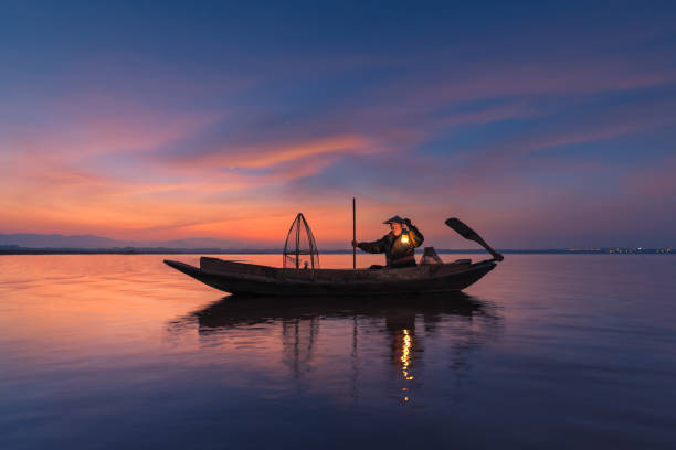 istock Asian fisherman 675251990