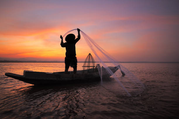 istock Asian fisherman 675254842