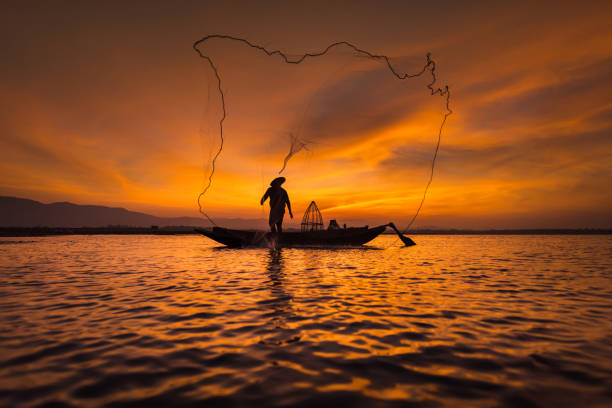 istock Asian fisherman 675255182