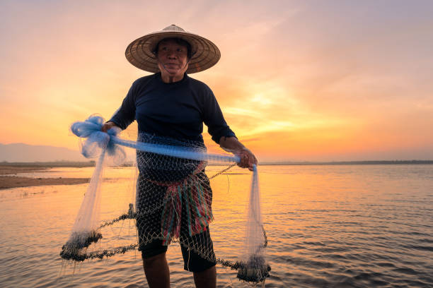 istock Asian fisherman 675255436