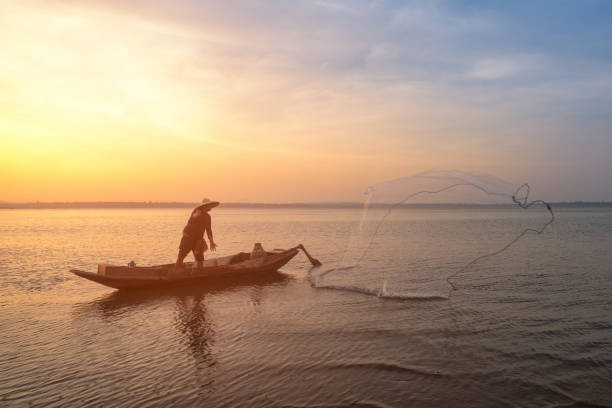 istock Asian fisherman 675258340