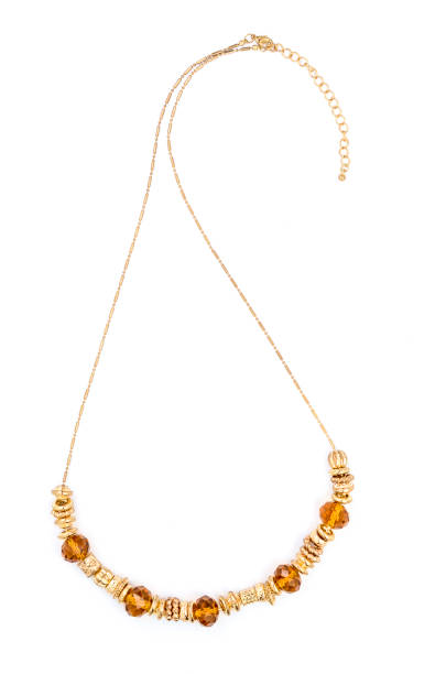 istock necklace with amber beads on white background 675268128
